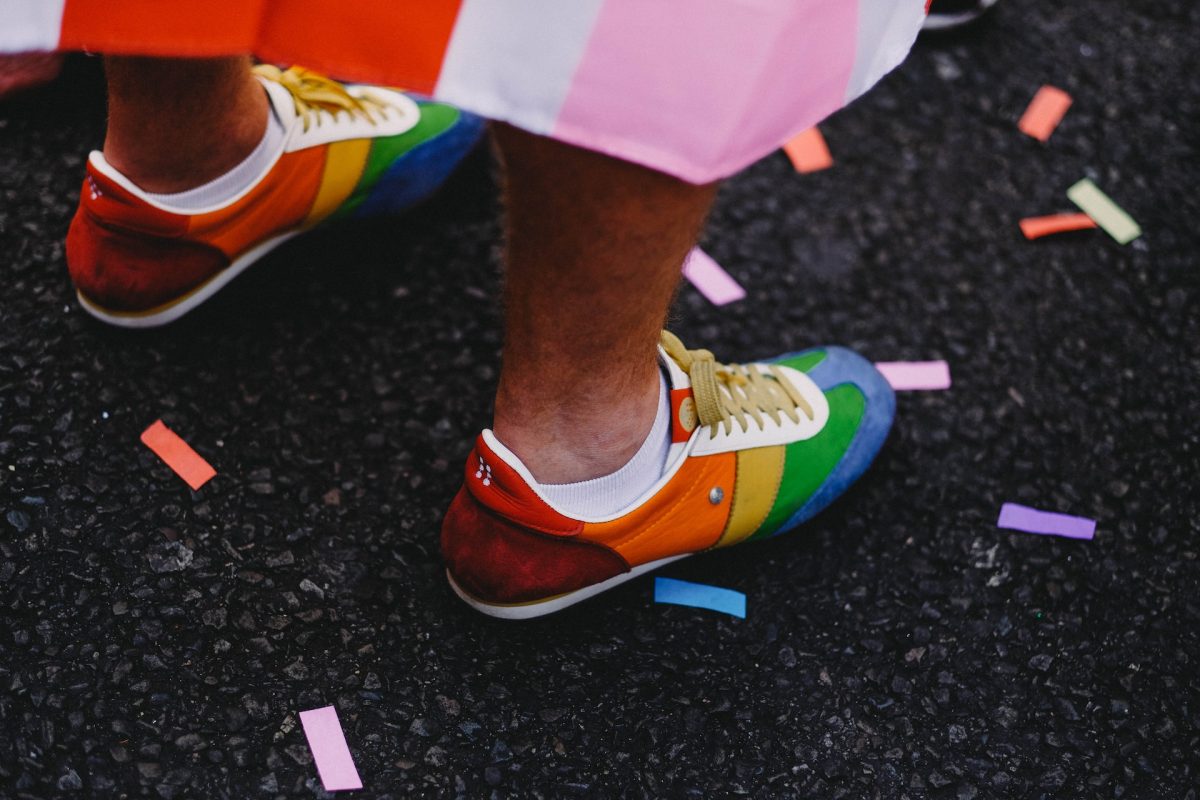 A pair of rainbow sneakers.